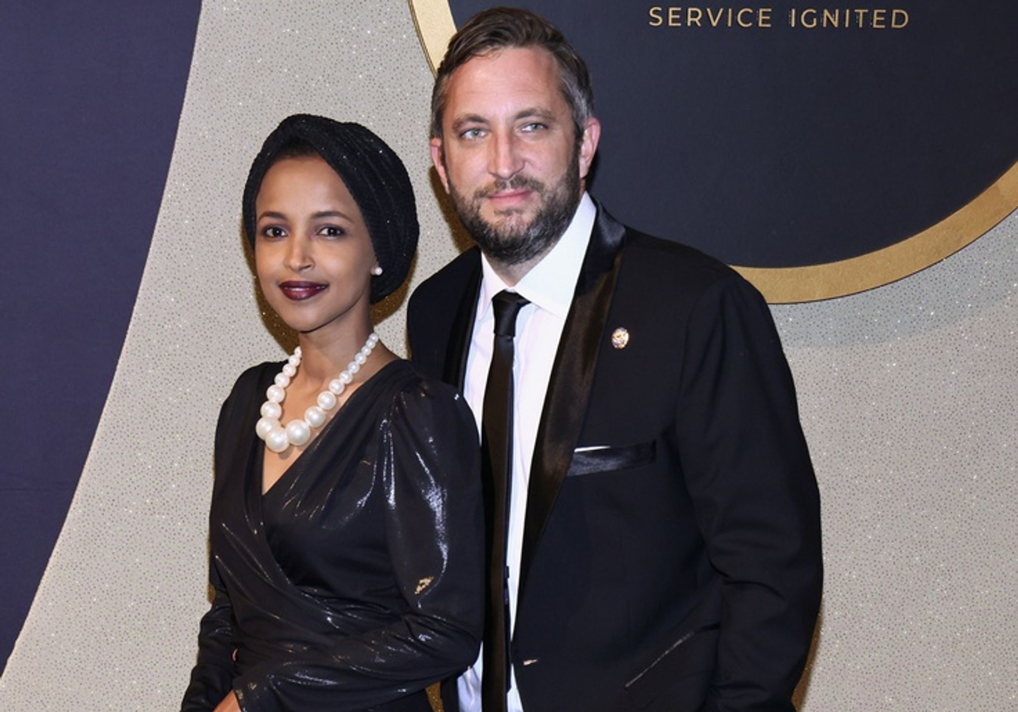Ilhan Omar Claims She's Struggling Financially. Taxpayers Paid Her Rent While Her Husband's Company Raked in Millions From Indian Billionaire.